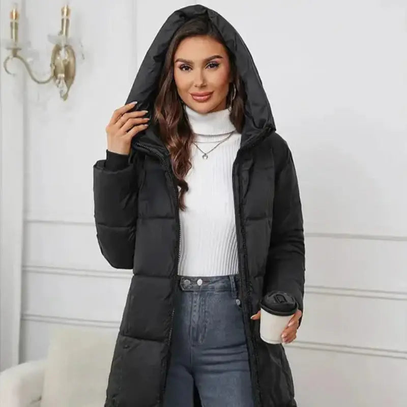 Parka noire femme avec tissu extérieur déperlant et longue capuche