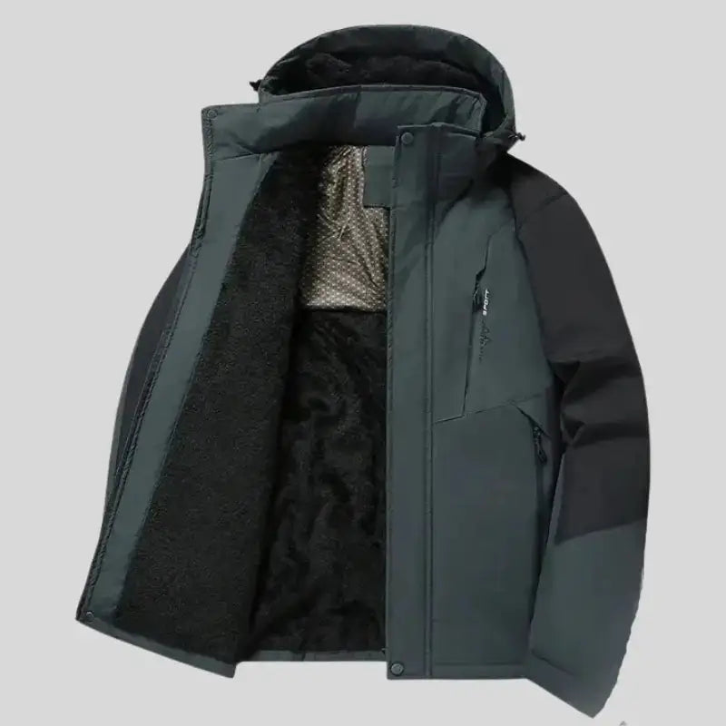 Intérieur de la Parka capuche homme, tissu déperlant et doublure synthétique matelassée pour confort.