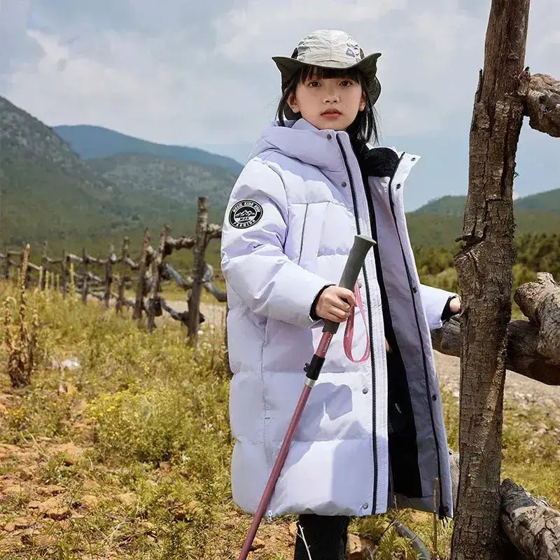 Parka fille 10 ans à capuche en couleur violet, idéale pour les sorties dans la nature.