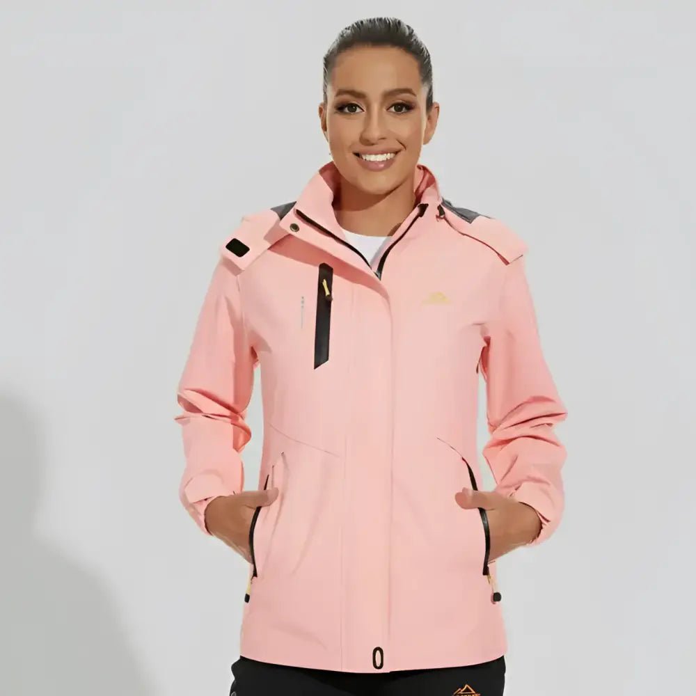 Parka femme capuche réglable de couleur rose, parfaite pour les journées fraîches et décontractées.