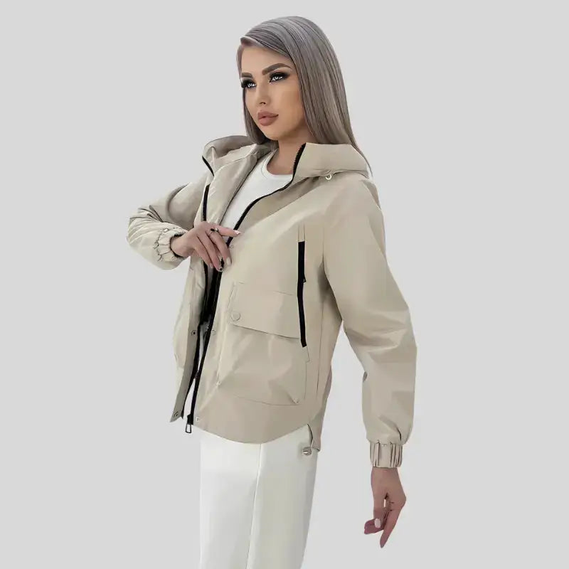 Parka noir femme avec capuche réglable, doublure intérieure, veste beige windbreaker